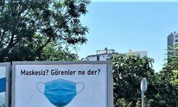 Mersin'de vatandaşlar koronavirüse karşı afişlerle uyarılıyor